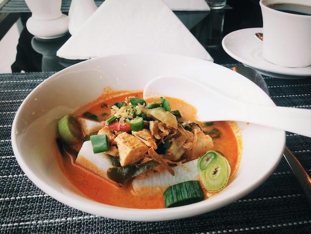 close-up of lontong served in bowl