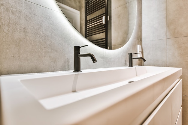 Close up of luxury faucet in an elegant bathroom