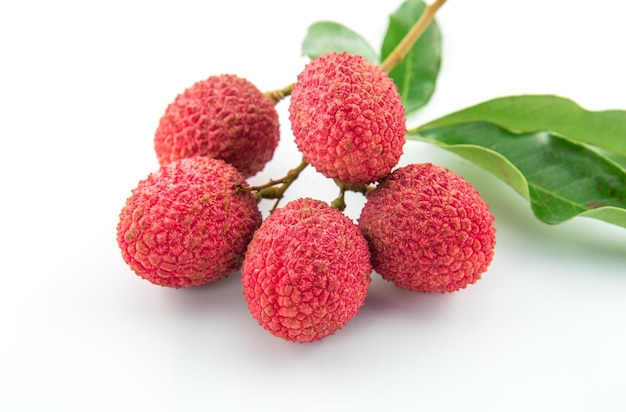 close-up of lychees over white background