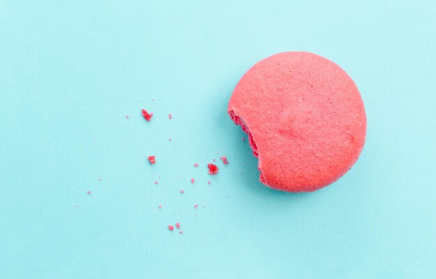 Close-up of macaroon on blue background