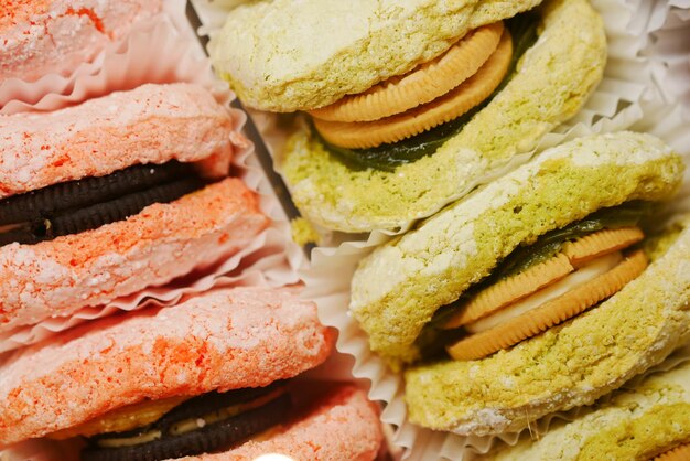 Close up of macaroons with orange and chocolate