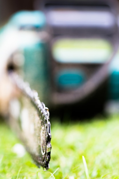 Close-up of machine on grass