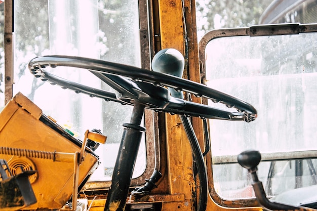 Photo close-up of machine part by car window