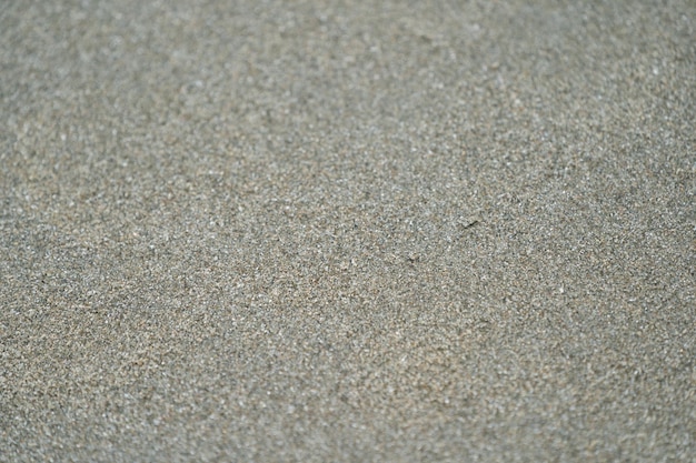 Close up and macro dark brown and black sand for any background