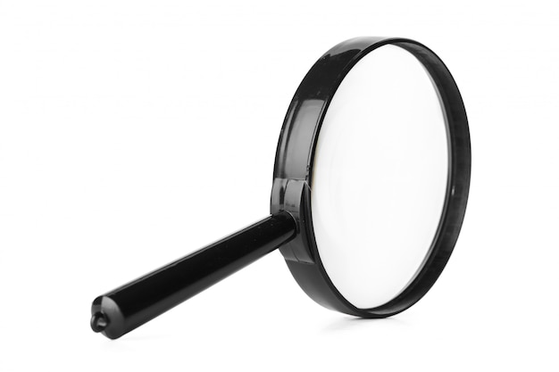 Photo close up of magnifying glass isolated on white background