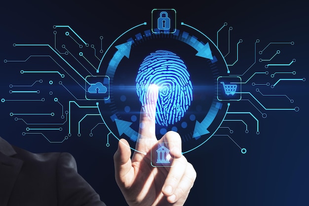 close up of male hand pointing at creative blue fingerprint scanning interface on dark background biometrics information network data security and future concept double exposure