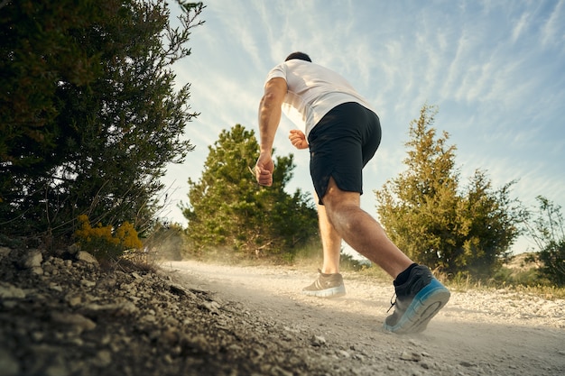 Close up of a man climbing the mountain