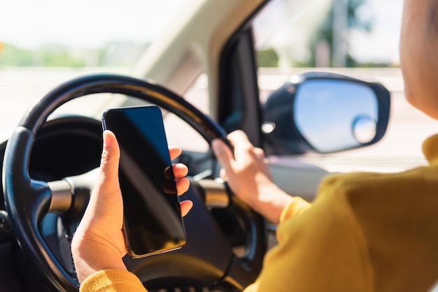 Photo close-up of man driving car