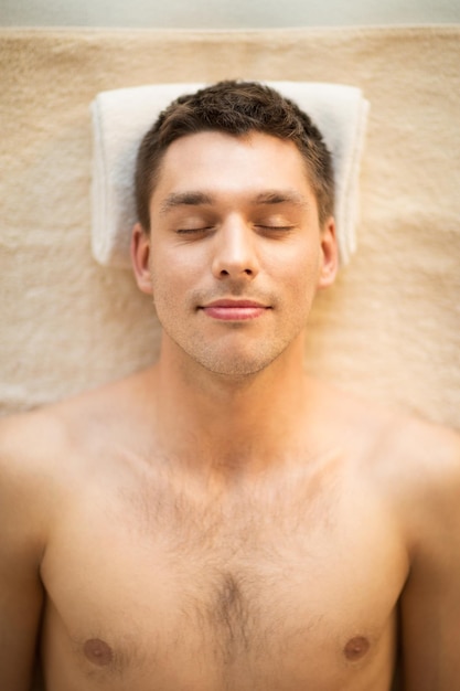 close up of man face in spa salon