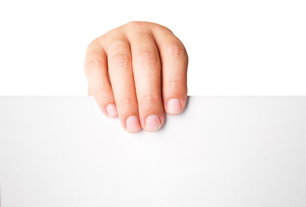 Close up of man hand holding blank advertising card on white