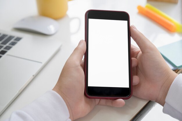 Close up of man hand holding smart phone.