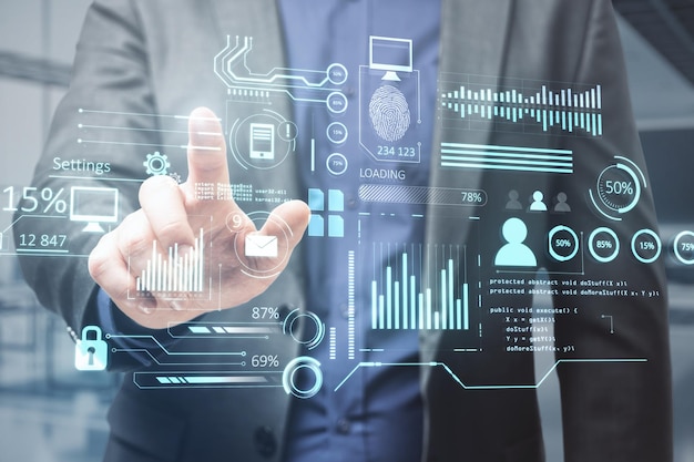 Close up of man hand pointing at creative glowing business
chart interface hologram on blurry office interior background
company digital data guide and computer analysis concept double
exposure