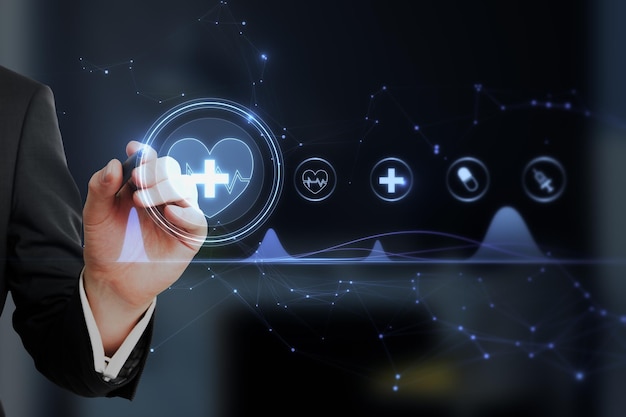 close up of man hand with pen pointing at creative polygonal medical interface hologram on blurry background online healthcare cardiology and technology concept double exposure