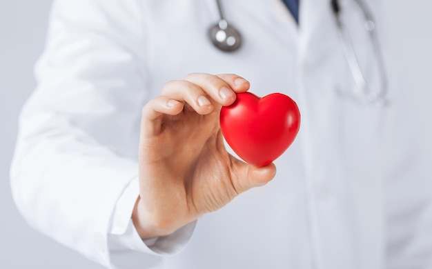 close up of man hands with heart