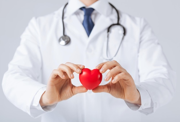 close up of man hands with heart