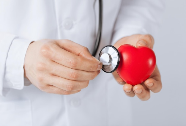 close up of man hands with heart