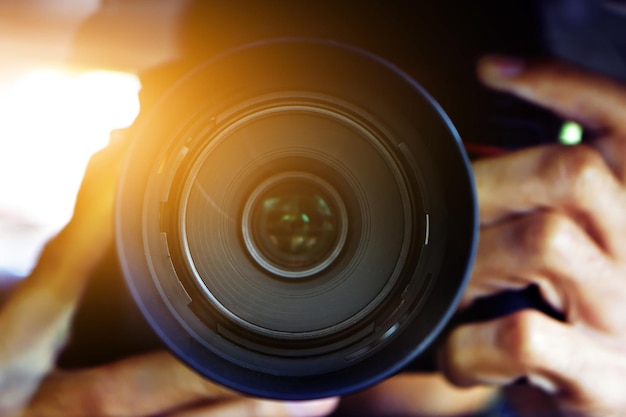 Close-up of man holding camera