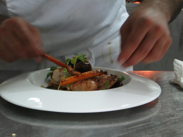 Close-up of man holding food