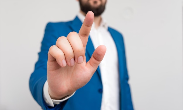 Close-up of man holding hands