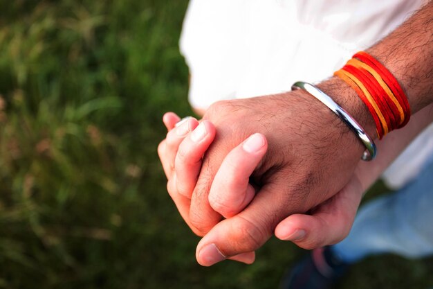 Close-up of man holding hands