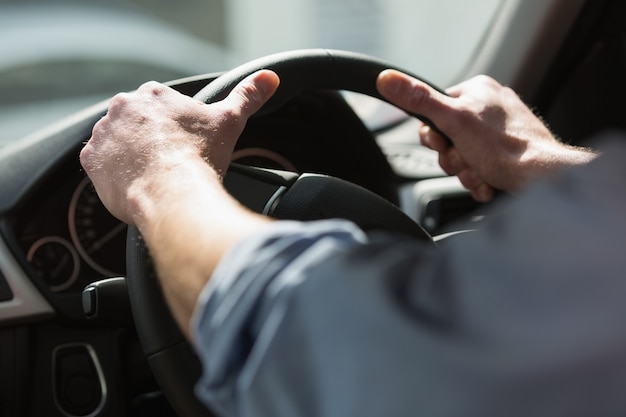 Close up of man holding his wheel