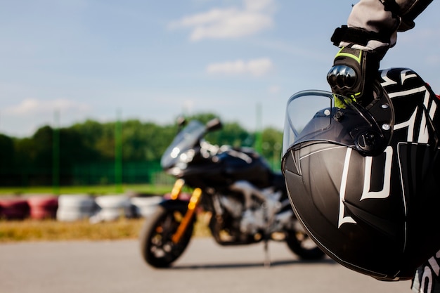 Close up man holding protection helmet