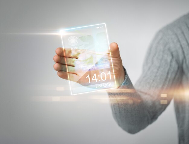 close up of man holding transparent phone