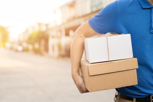 Close-up of man holding umbrella in box