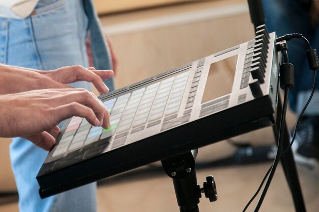 close-up of man playing musical instrument