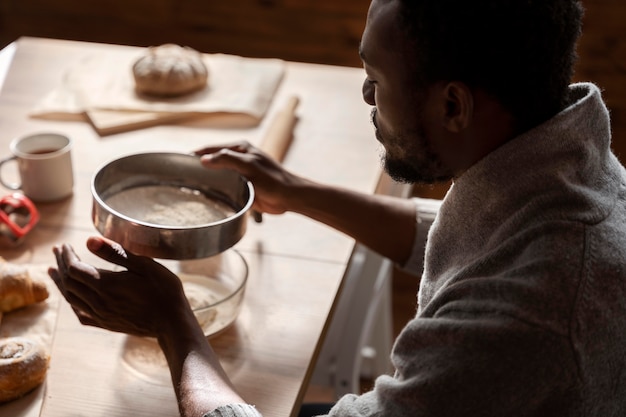 close up man preparing breakfast