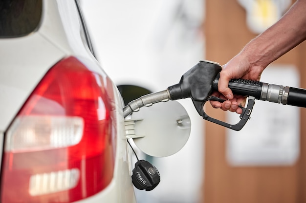 Close-up of a man pumping diesel in to the tank