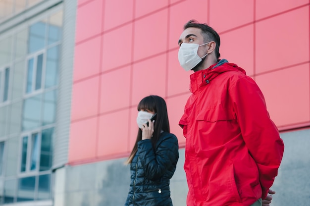 Close up on man puts on a medical mask