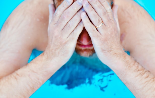 Close-up of man in swimming pool