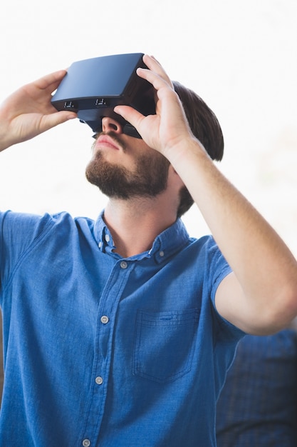 Close-up of man using virtual reality glasses