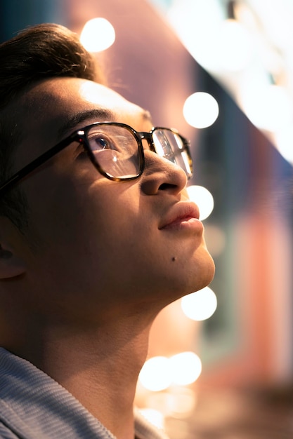 close up man wearing glasses