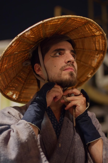 Close-up of man wearing hat