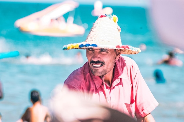 Close-up of man wearing hat