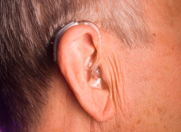close-up of man wearing hearing aid
