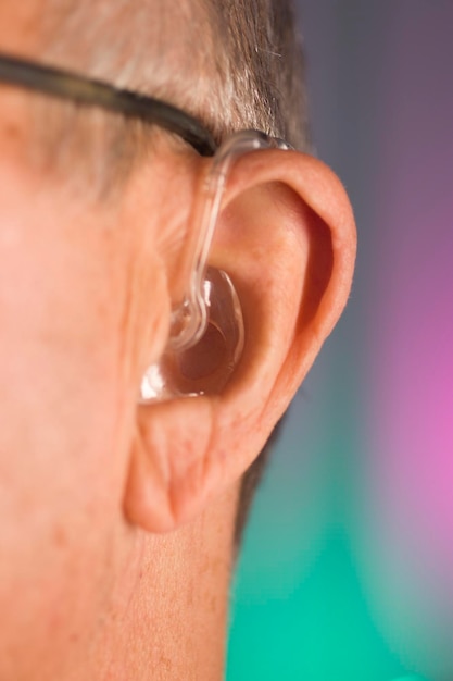 Close-up of man wearing hearing aid