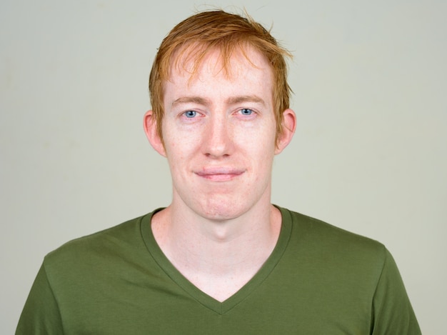 Close up of man with red hair isolated