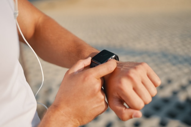 close up man with smart watch