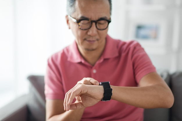 close up of man with smart watch