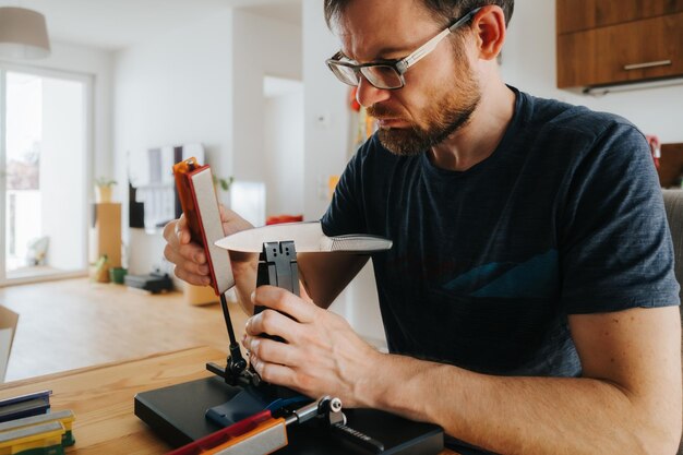 Photo close-up of man working at home