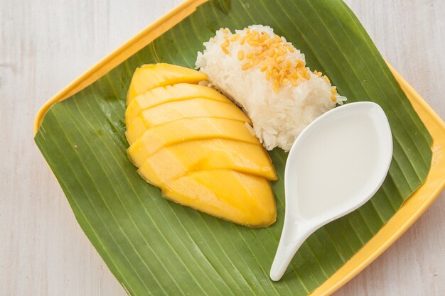 close up mango and sticky rice Placed on banana leaves On the plate