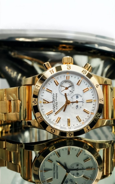 close up of mans hand holding wristwatch