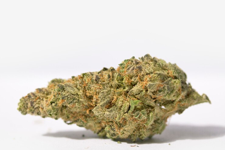 Photo close-up of marijuana against white background