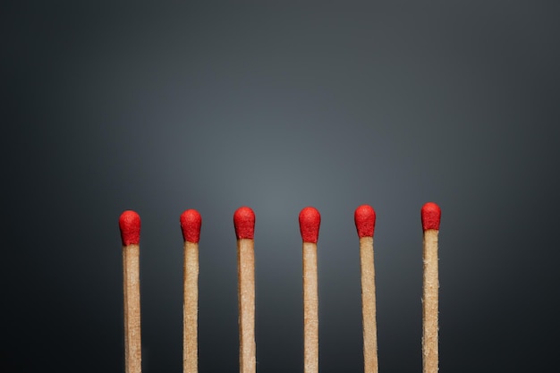 close-up of matchstick against black background