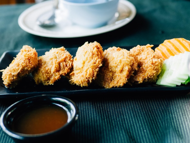 Photo close-up of meal served on table