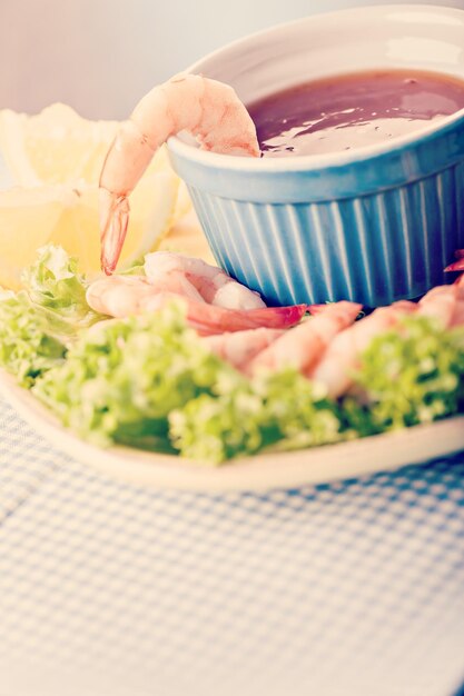 Photo close-up of meal served on table