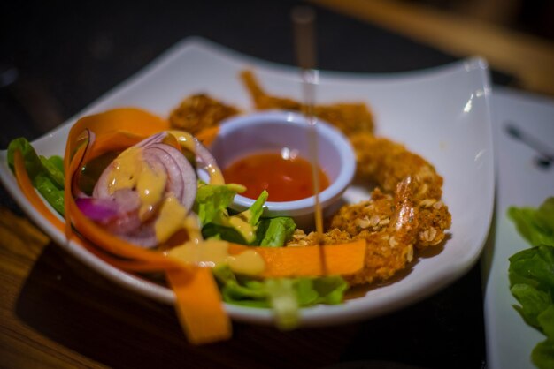 Close-up of meal served on table